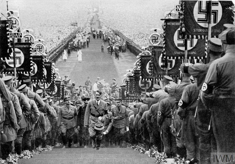 Nazi Germany: Adolf Hitler addressing a large Nazi Party rally