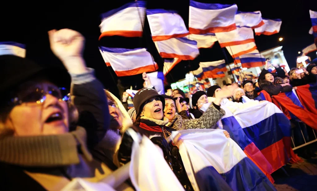 Russia-Ukraine Conflict: Crimean citizens gathered to vote in the 2014 referendum on whether to join Russia, with significant international scrutiny.