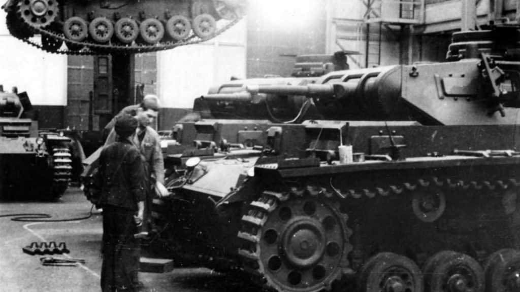 Panzer III tanks on assembly line in a Nazi Germany factory during World War II