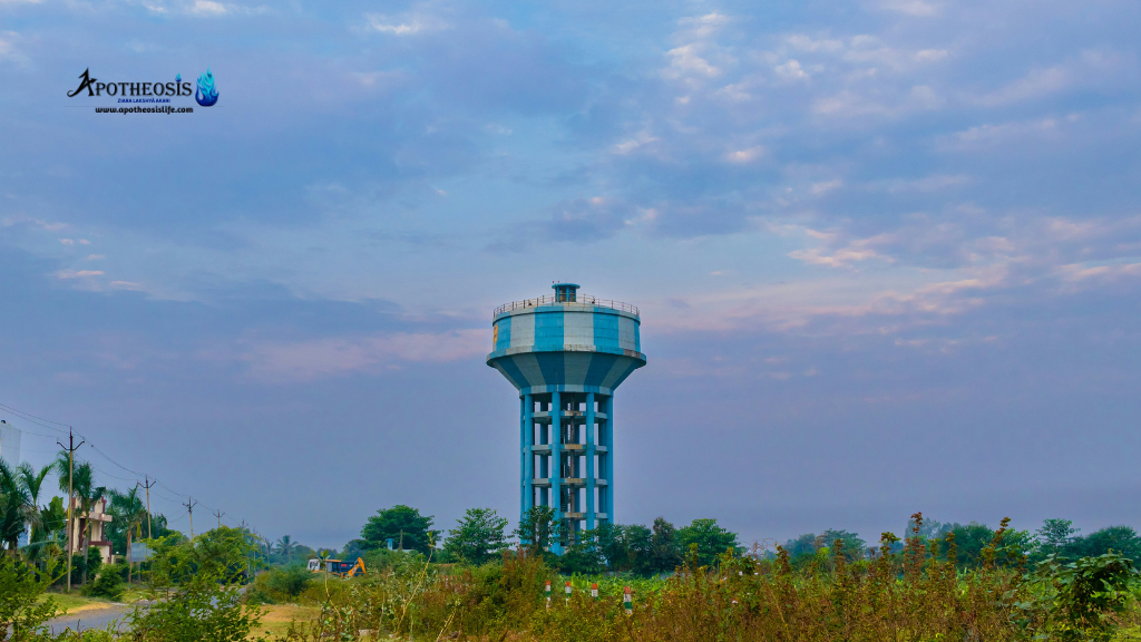 Water tower in a semi‑rural area showing infrastructure stress linked to Groundwater Depletion.